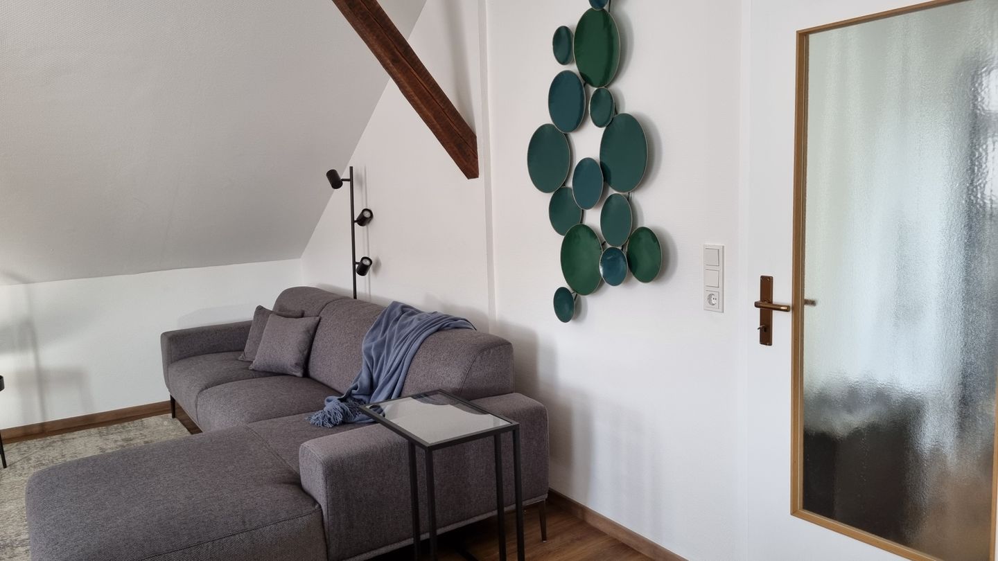 Haus Borkumitte Appartement Mellum Haus Borkumitte - Wohnzimmer Sofaecke