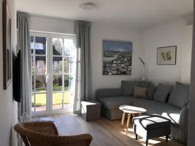 Wohnzimmer der Ferienwohnung Reethuk in Norddorf auf Amrum Haus Pesel Ferienwohnung *Reethuk*