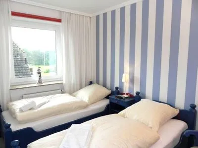 Schlafzimmer in der Ferienwohnung Jessen´s Wattblick in Wittdün auf Amrum Ferienwohnung *Jessen´s Wattblick*