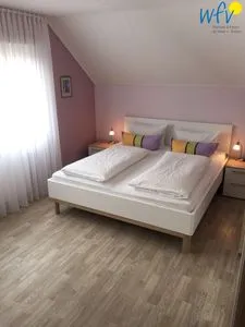 Schlafzimmer Ferienhaus Kiebitzdüne Ferienwohnung Auster