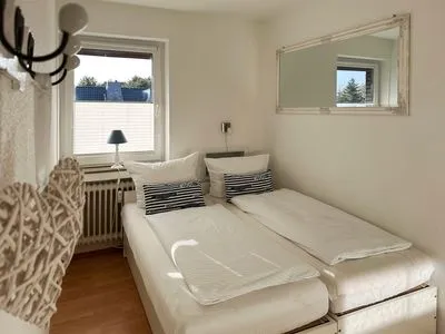 Schlafzimmer der Ferienwohnung Kniepsand in Wittdün auf Amrum Haus Diana Ferienwohnung „Kniepsand"