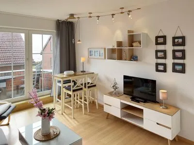 Wohnzimmer der Ferienwohnung Südspitze 18/6 Meerblick in Wittdün auf Amrum Haus *Südspitze 18* Ferienwohnung Südspitze 18/6 - Meerblick