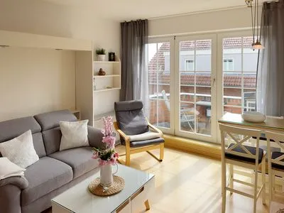 Wohnzimmer der Ferienwohnung Südspitze 18/6 Meerblick in Wittdün auf Amrum Haus *Südspitze 18* Ferienwohnung Südspitze 18/6 - Meerblick