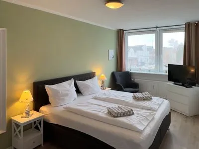 Schlafzimmer 2 der Ferienwohnung "Willkommen bei den Hartmanns" in Wittdün auf Amrum Haus Nordenlicht Ferienwohnung „Willkommen bei den Hartmanns"