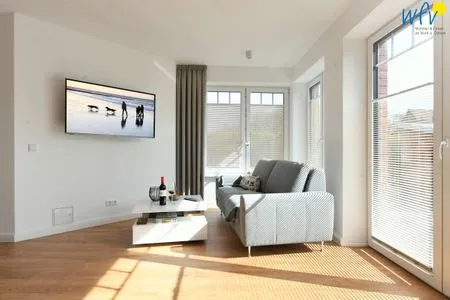 Wohnzimmer Haus im Dorfgroden 14 Ferienwohnung Muschelsucher