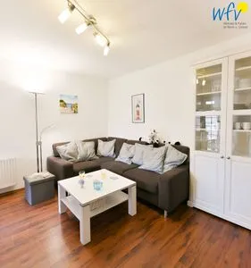 Wohnzimmer Familienhaus im Dorfgroden 27 Ferienwohnung Zugvogel