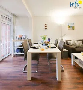 Wohnzimmer Familienhaus im Dorfgroden 27 Ferienwohnung Zugvogel