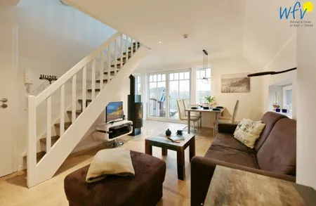 Wohnzimmer Bootshaus in den Dünen - 5 Ferienwohnung Strandgut