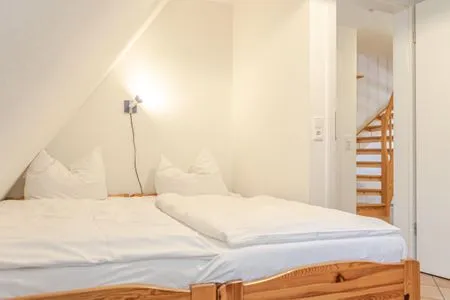 Schlafzimmer mit zwei Einzelbetten Achtern Diek Achtern Diek 8a - Wohnung 5