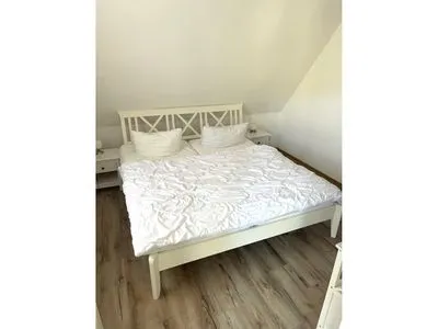 Schlafzimmer mit Doppelbett  Wohnung Manu