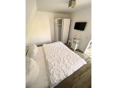 Schlafzimmer mit Doppelbett  Wohnung Manu