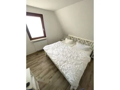 Schlafzimmer mit Doppelbett  Wohnung Manu