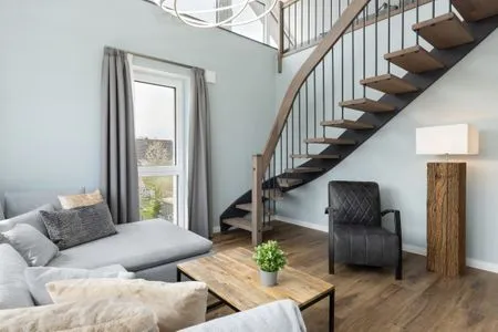 Wohnzimmer Sturmfrei Ferienwohnung "Galerie 3"