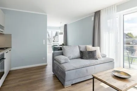 Wohnzimmer Sturmfrei Ferienwohnung "Suite 6"