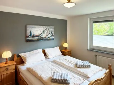 Schlafzimmer in der Ferienwohnung Üüs Aran 4 in Süddorf auf Amrum Haus *Üüs Aran* Ferienwohnung *Üüs Aran 4*