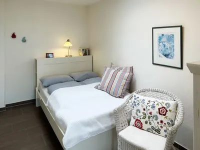 Schlafzimmer der Ferienwohnung Watt'n Blick in Wittdün auf Amrum Haus Nordenlicht Ferienwohnung Watt'n Blick