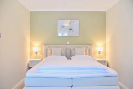 Schlafzimmer mit Doppelbett Logierhaus Friedrich WE 6 - "Strandperle"