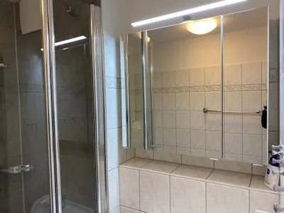 Badezimmer mit Duche Residenz am Strand Wohnung 3-50