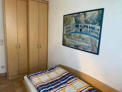 Schlafzimmer mit zwei Einzelbetten Residenz am Strand Wohnung 3-50