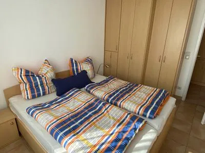 Schlafzimmer mit Doppelbett Residenz am Strand Wohnung 3-50