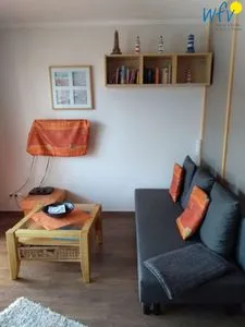 Wohnzimmer Holiday Residenz II Ferienwohnung Sandburg