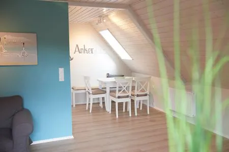 Wohnzimmer Ferienwohnung Ankerplatz mit SPIELSCHEUNE am Wittensee