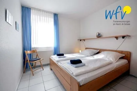 Schlafzimmer Haus Dünenblick Ferienwohnung 4