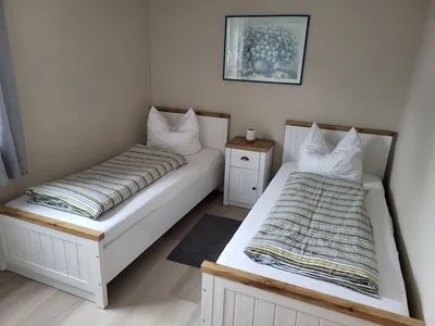 Schlafzimmer mit Einzelbetten Hoppenberg 5 - Wohnung Schröder