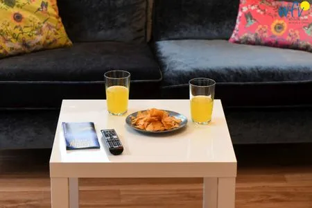 Wohnzimmer Logirhaus Doyen Ferienwohnung 9