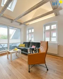Wohnzimmer Logirhaus Doyen Ferienwohnung 9