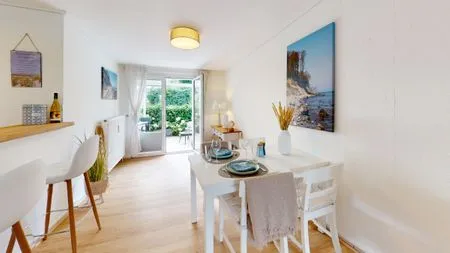 Wohnzimmer Küstenplatz Sandkorn - mit zwei Sonnenterrassen