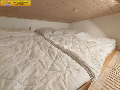Bedroom Ferienhaus Almrausch by FiS - Fun in Styria