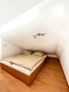 Schlafniesche über dem Wohnzimmer Residenz am Strand Wohnung 1-21