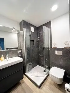 Badezimmer mit Dusche Residenz am Strand Wohnung 1-21