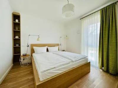 Schlafzimmer mit Doppelbett Logierhaus Friedrich WE 12 - "Dünenglitzern"