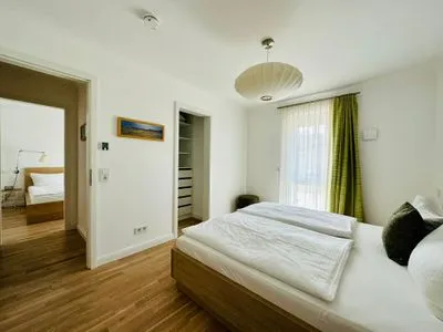 Schlafzimmer mit Doppelbett Logierhaus Friedrich WE 12 - "Dünenglitzern"