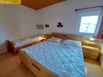 Schlafzimmer Apartment Grimmingsuite by FiS - Fun in Styria