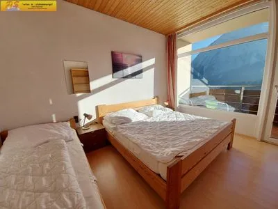 Schlafzimmer Apartment Grimmingsuite by FiS - Fun in Styria