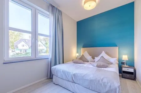 Ferienwohnung Sünnkieker Ostseebad Wustrow - ZweiWasser Alte Seefahrtschule Schlafzimmer  Sünnkieker