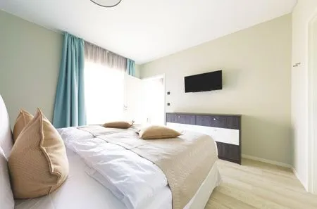 Ferienwohnung Lüttstuv Ostseebad Wustrow - ZweiWasser Alte Seefahrtschule Schlafzimmer  Lüttstuv