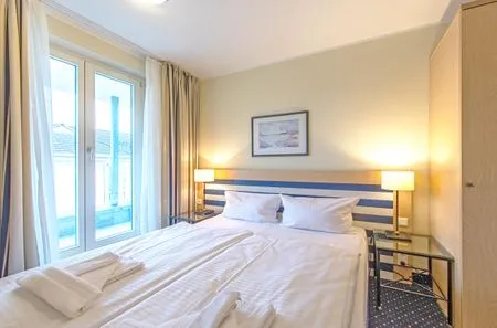 Ferienwohnung Deichkieker Aparthotel Zingst - Schlafzimmer  Deichkieker
