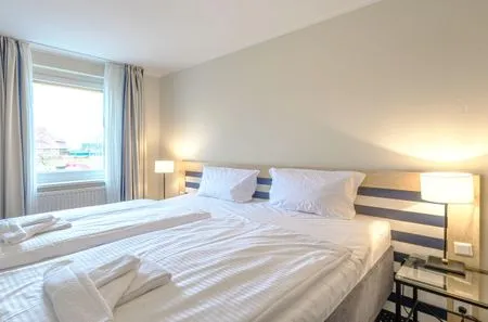Ferienwohnung Deichblick Aparthotel Zingst - Schlafzimmer  Deichblick