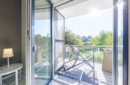 Ferienwohnung Achterndieck Ostseebad Wustrow - ZweiWasser Alte Seefahrtschule Balkonzugang  Achterndieck