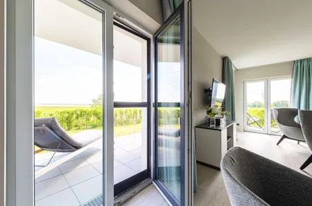 Ferienwohnung Boddenkieker Ostseebad Wustrow - ZweiWasser Alte Seefahrtschule Terrassenzugang  Boddenkieker