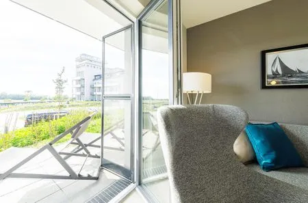 Ferienwohnung Waterkant Ostseebad Wustrow - ZweiWasser Alte Seefahrtschule Terrassenzugang  Waterkant