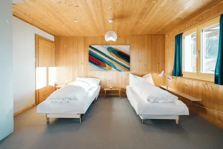 Schlafzimmer mit zwei Einzelbetten Chalet Engihalde