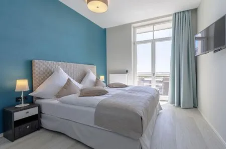 Ferienwohnung Wustrower Welle Ostseebad Wustrow ZweiWasser Alte Seefahrtschule Schlafzimmer  Wustrower Welle