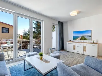 Wohnzimmer Bernsteinquartier, Ferienhaus 09a "Meeresrauschen"