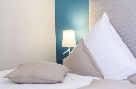 Ferienwohnung Strandräuber Ostseebad Wustrow ZweiWasser Alte Seefahrtschule Schlafzimmer Doppelbett  Strandräuber