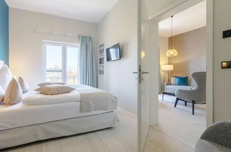 Ferienwohnung Columbus Suite Ostseebad Wustrow ZweiWasser Alte Seefahrtschule Schlafzimmer  Columbus Suite